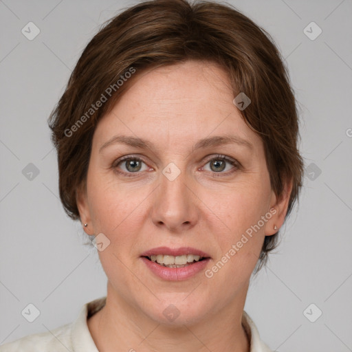 Joyful white adult female with medium  brown hair and grey eyes