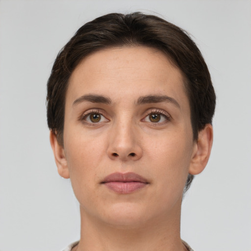 Neutral white young-adult female with short  brown hair and brown eyes