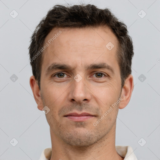 Neutral white adult male with short  brown hair and brown eyes