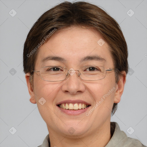 Joyful white adult female with short  brown hair and brown eyes