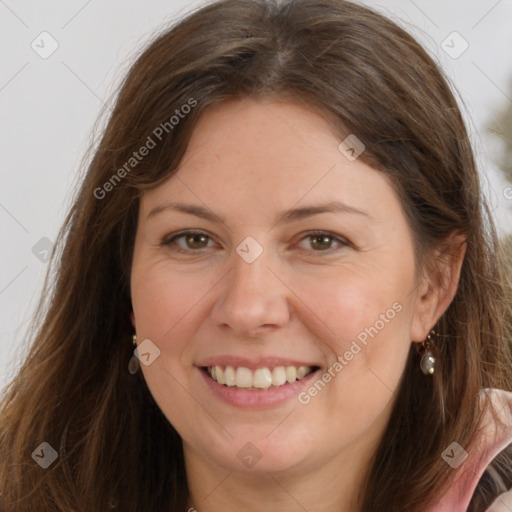 Joyful white adult female with long  brown hair and brown eyes