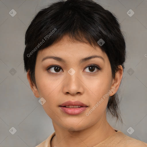 Joyful asian young-adult female with medium  brown hair and brown eyes