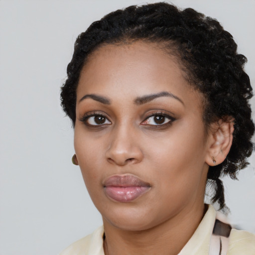 Neutral latino young-adult female with medium  black hair and brown eyes