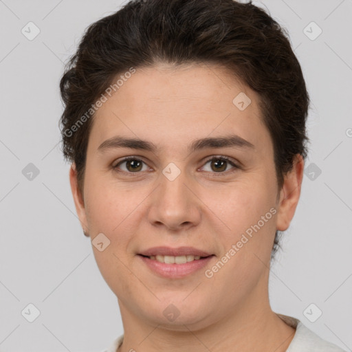 Joyful white young-adult female with short  brown hair and brown eyes