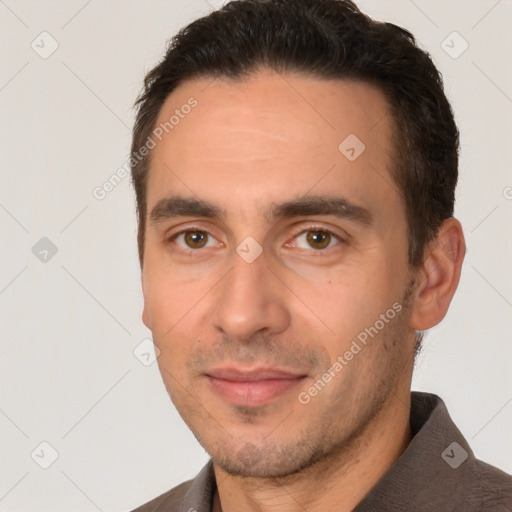 Joyful white young-adult male with short  brown hair and brown eyes