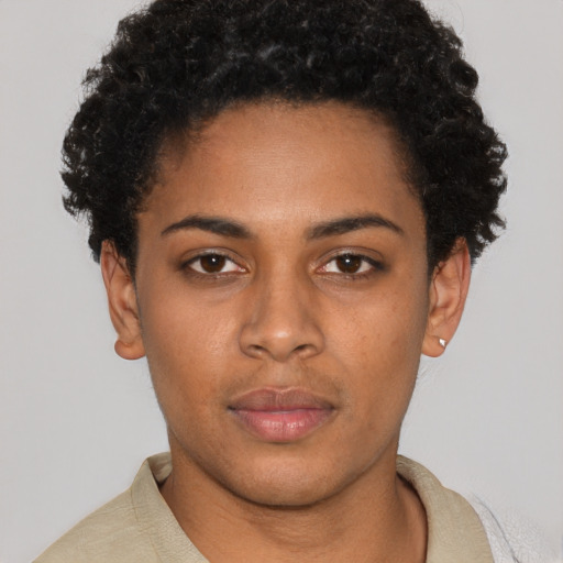 Neutral black young-adult female with short  black hair and brown eyes