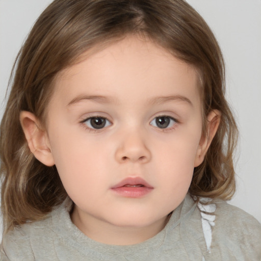 Neutral white child female with medium  brown hair and brown eyes