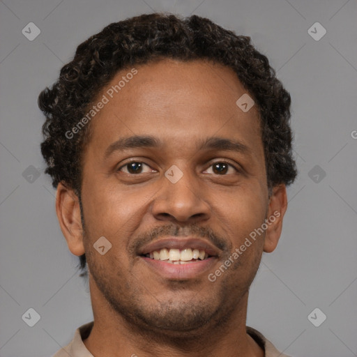 Joyful latino young-adult male with short  brown hair and brown eyes