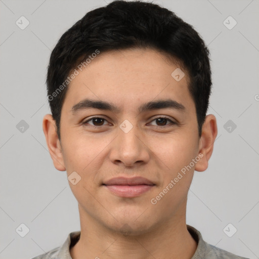 Joyful latino young-adult male with short  black hair and brown eyes