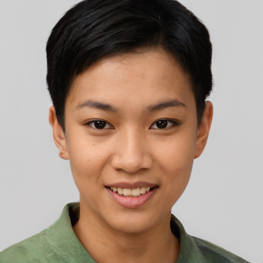 Joyful asian young-adult female with short  brown hair and brown eyes