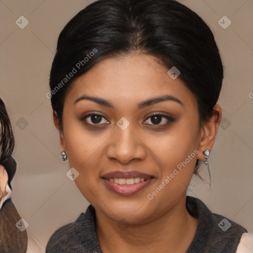 Joyful latino young-adult female with medium  brown hair and brown eyes