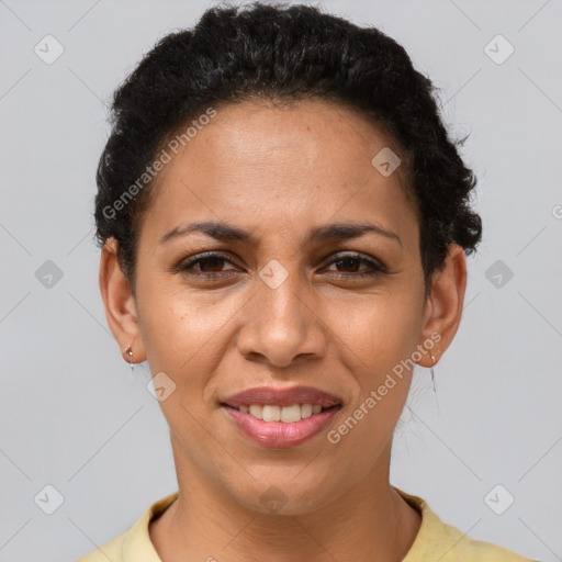 Joyful latino adult female with short  brown hair and brown eyes