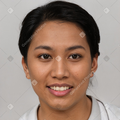 Joyful asian young-adult female with short  brown hair and brown eyes