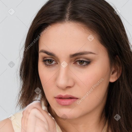 Neutral white young-adult female with long  brown hair and brown eyes