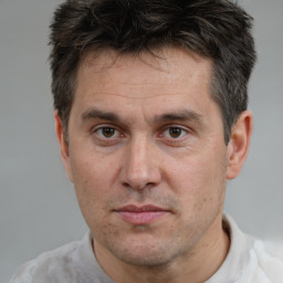 Neutral white adult male with short  brown hair and brown eyes