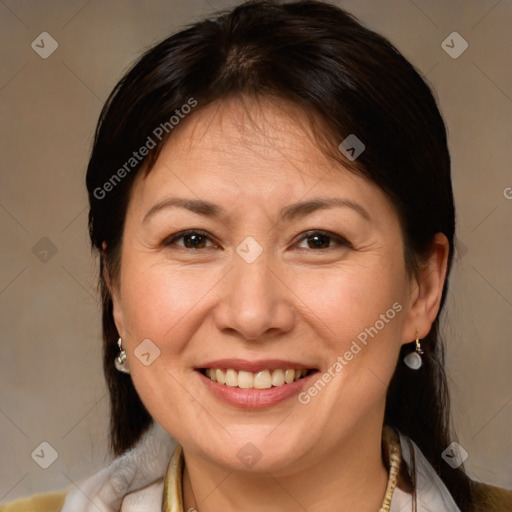 Joyful white adult female with medium  brown hair and brown eyes