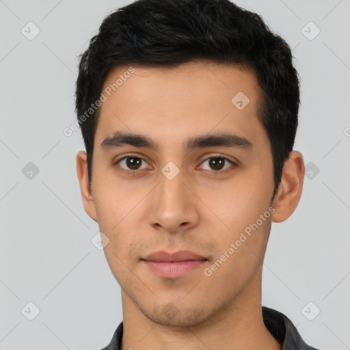 Neutral latino young-adult male with short  brown hair and brown eyes