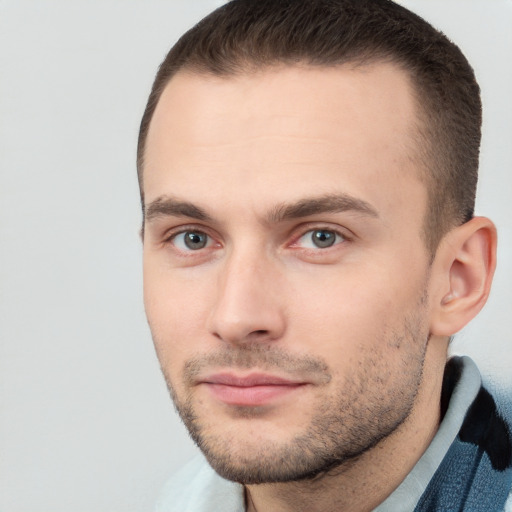 Neutral white young-adult male with short  brown hair and brown eyes