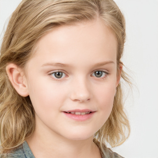 Joyful white child female with medium  brown hair and blue eyes