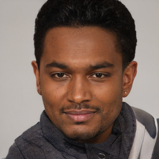 Neutral black young-adult male with short  black hair and brown eyes