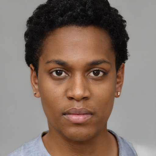 Neutral black young-adult female with short  black hair and brown eyes