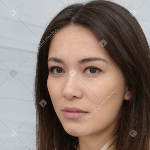 Neutral white young-adult female with long  brown hair and brown eyes