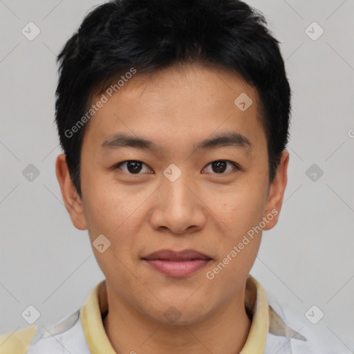 Joyful asian young-adult male with short  brown hair and brown eyes