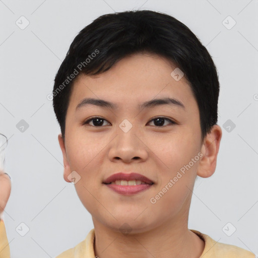 Joyful asian young-adult female with short  black hair and brown eyes