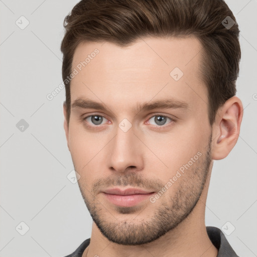 Neutral white young-adult male with short  brown hair and brown eyes