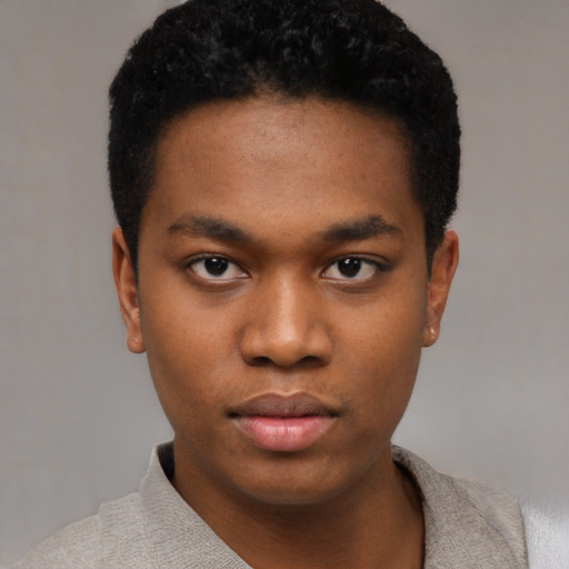 Neutral black young-adult male with short  black hair and brown eyes