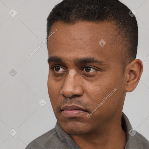 Neutral latino adult male with short  black hair and brown eyes