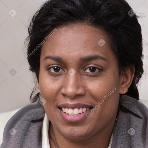 Joyful latino adult female with medium  brown hair and brown eyes