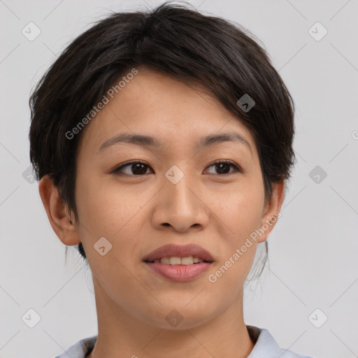 Joyful asian young-adult female with short  brown hair and brown eyes