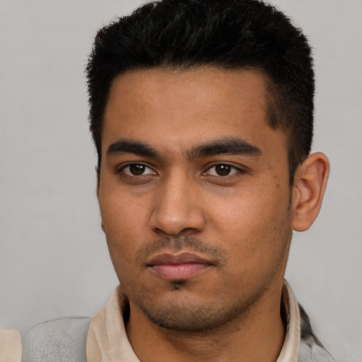 Neutral latino young-adult male with short  black hair and brown eyes