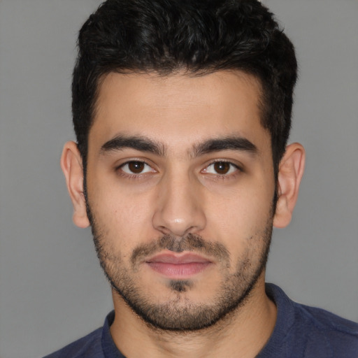 Neutral white young-adult male with short  black hair and brown eyes