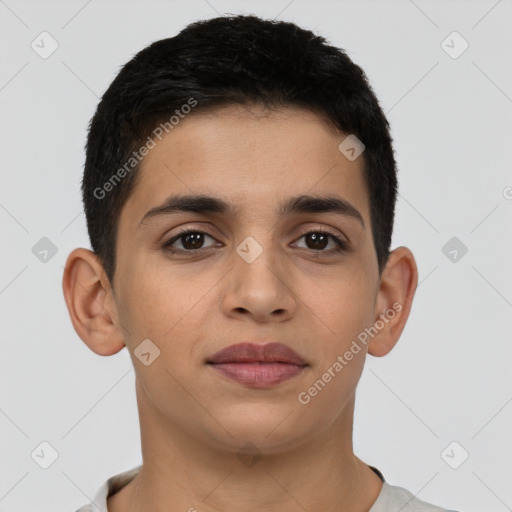 Joyful latino young-adult male with short  brown hair and brown eyes