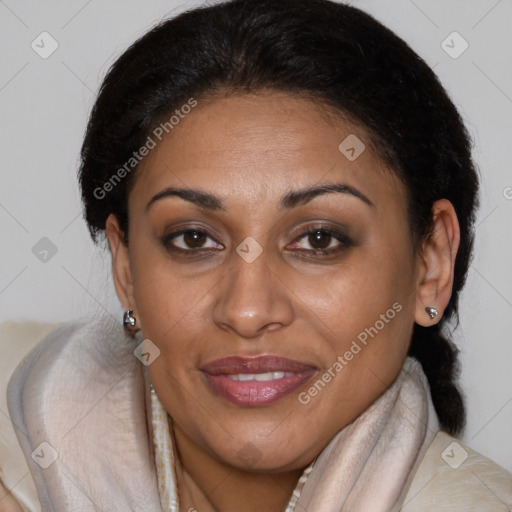 Joyful latino adult female with medium  brown hair and brown eyes