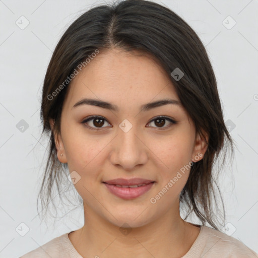 Joyful asian young-adult female with medium  brown hair and brown eyes