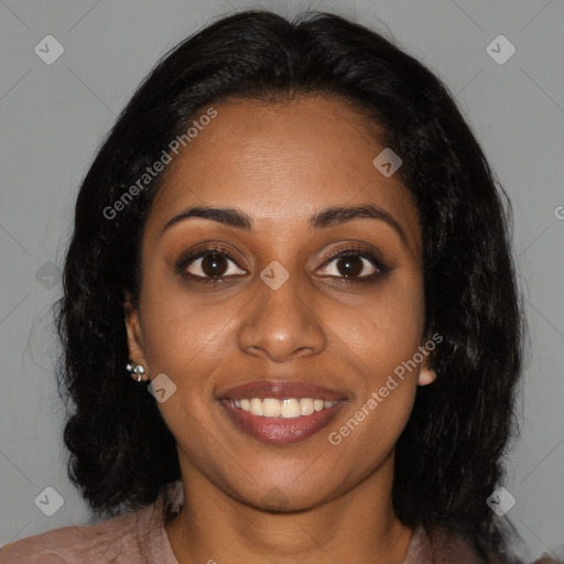 Joyful black young-adult female with medium  black hair and brown eyes