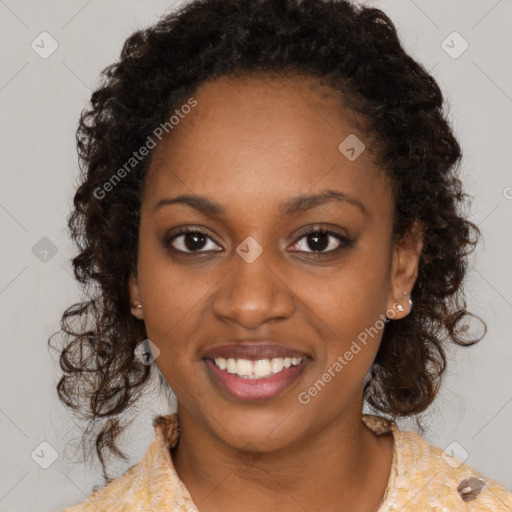 Joyful black young-adult female with medium  brown hair and brown eyes