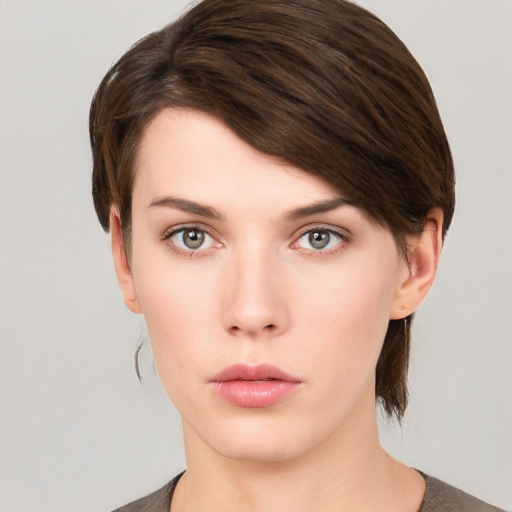 Neutral white young-adult female with short  brown hair and brown eyes