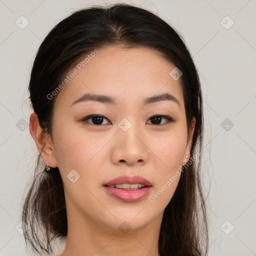 Joyful asian young-adult female with long  brown hair and brown eyes