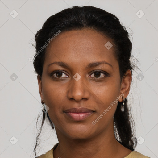 Joyful black young-adult female with medium  black hair and brown eyes