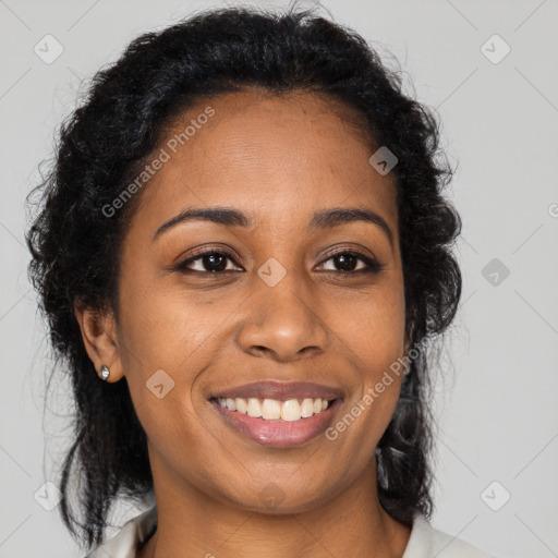 Joyful black young-adult female with medium  brown hair and brown eyes