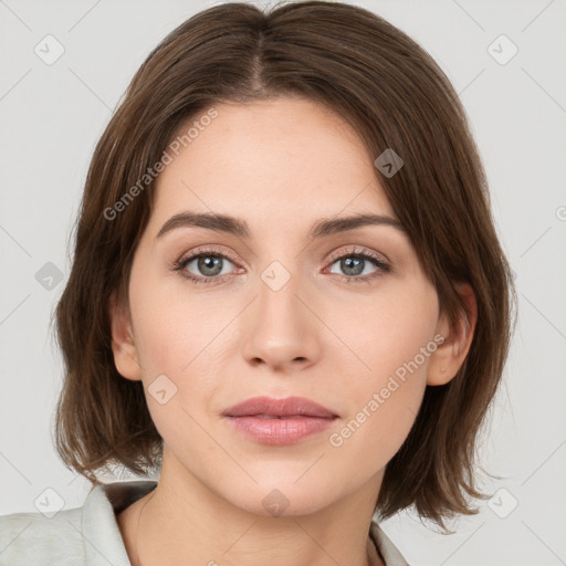 Joyful white young-adult female with medium  brown hair and green eyes