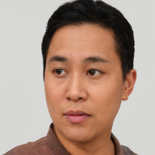 Neutral asian young-adult male with short  black hair and brown eyes
