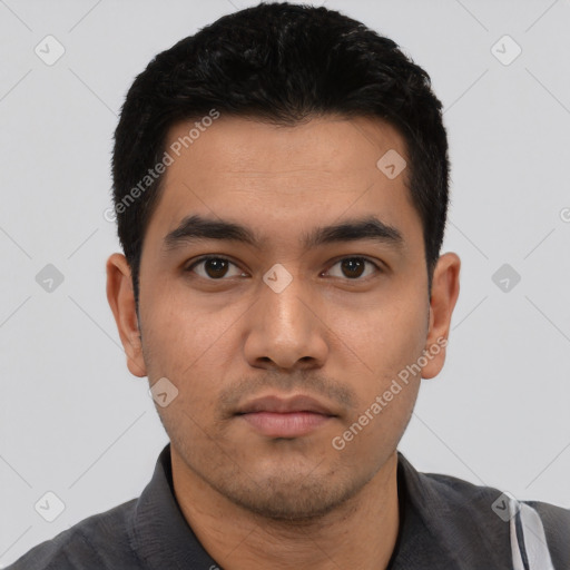 Neutral latino young-adult male with short  black hair and brown eyes