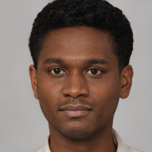Neutral black young-adult male with short  brown hair and brown eyes
