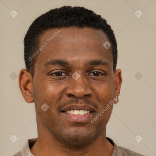 Joyful latino young-adult male with short  brown hair and brown eyes