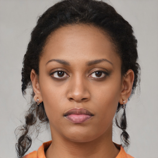 Neutral latino young-adult female with medium  brown hair and brown eyes